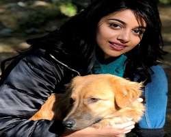 She loves dogs. Her dog is luckier than many Indian guys. They must be jealous of him! ; She loves dogs. Her dog is luckier than many Indian guys. They must be jealous of him! ;)